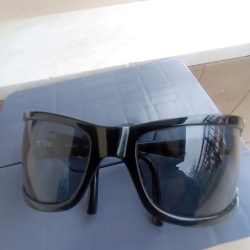 Vogue sunglasses used, black with scratch on lens