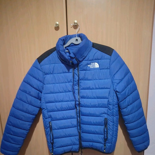 The North Face blue jacket like new, size M unisex