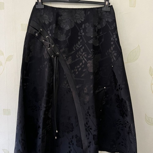 A-Style black skirt with floral pattern and satin detail, new