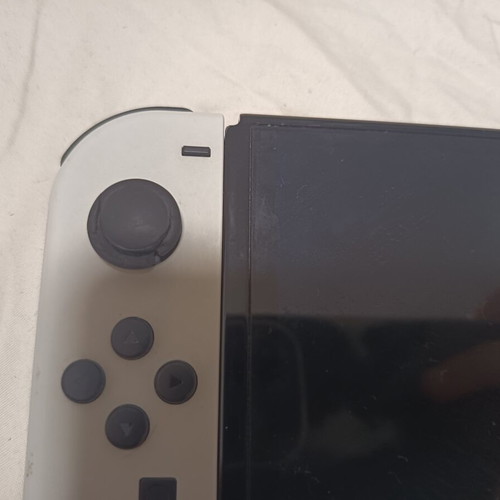 Nintendo Switch with three games