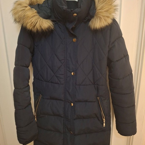 Medium blue jacket used with belt at waist