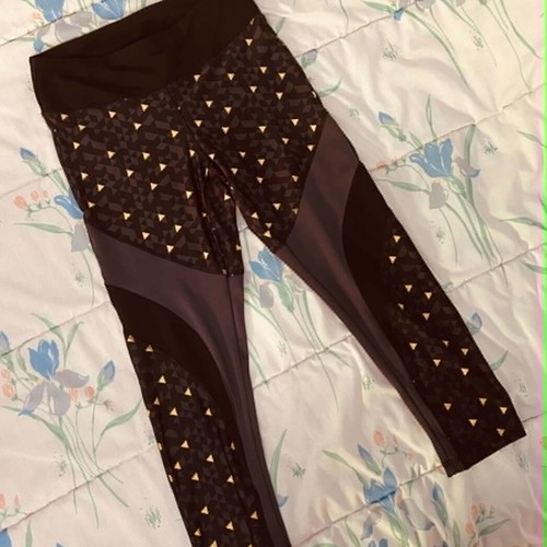 Active 21 black sports leggings with yellow patterns, size M