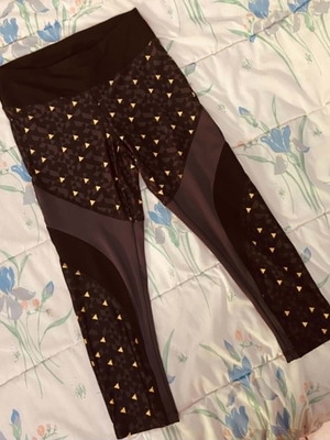 Active 21 black sports leggings with yellow patterns, size M