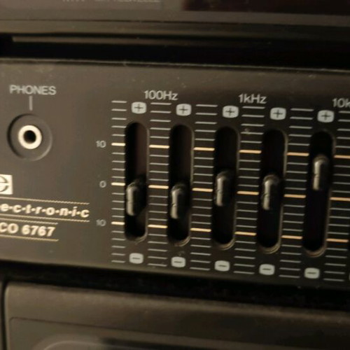 Booster stereo system used, 90s style, removable speakers
