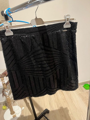Mini skirt with sequins Attrattivo black, like new