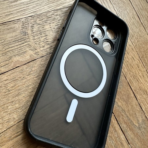 iPhone 14 Pro case with broken right lens protector