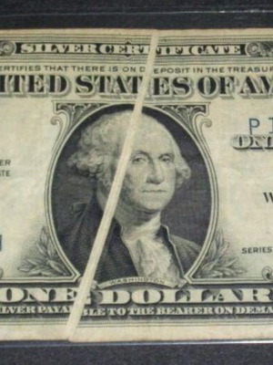 1935-E $1 Silver Certificate with Double Gutter Fold and First Print Misaligned used