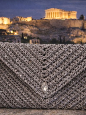 Πλεκτό clutch καινούργιο σε ασημί λάμψη