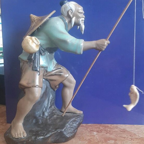 Chinese porcelain fisherman with fishing rod and fish 21 cm height