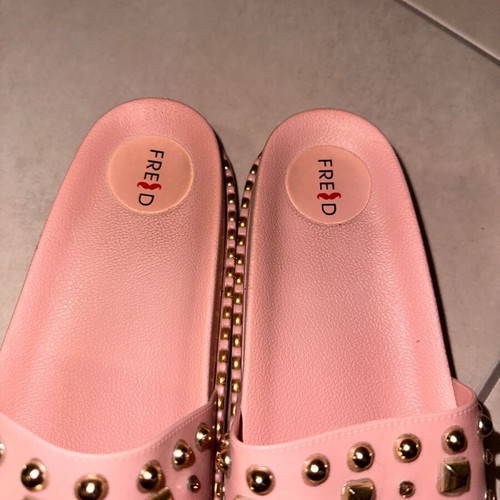 Keep Fred pink soft slippers like new with gold studs