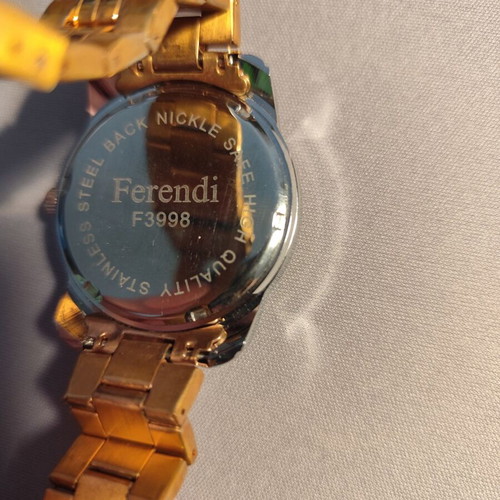Ferendi F3998 women's watch like new, gold color