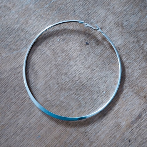 Hoop earring used, gold color, single piece