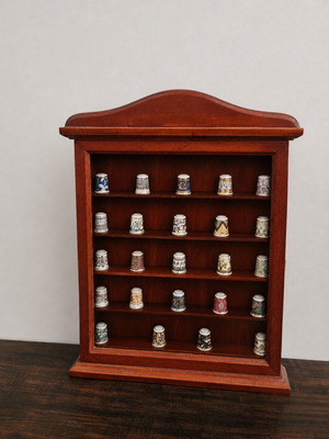 Jeannie Croton collectible thimble set of 24 with wooden display case