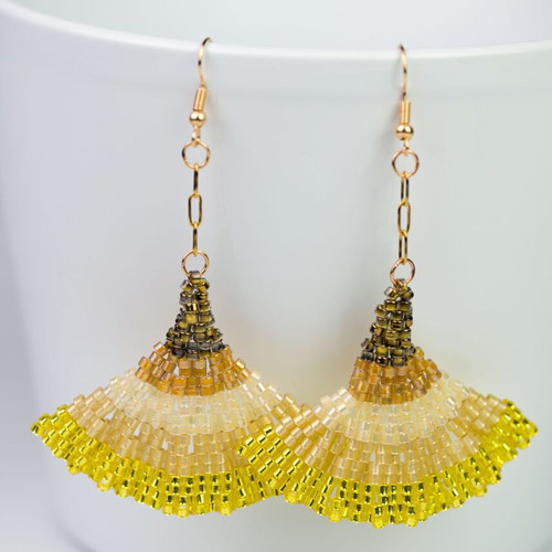 Handmade earrings with yellow and orange glass beads, steel elements