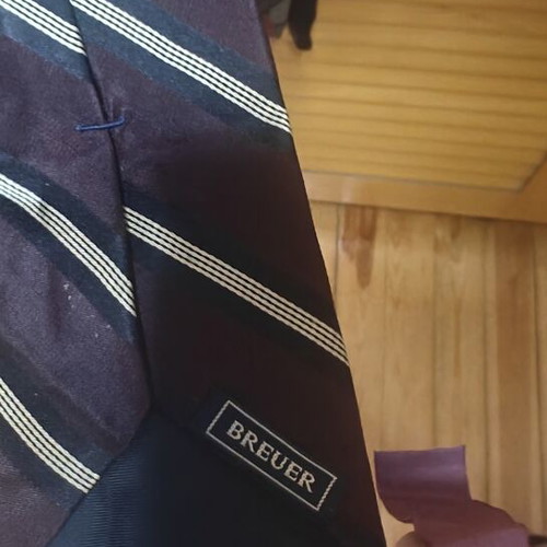 Collection of 8 men's ties with classic colors and patterns