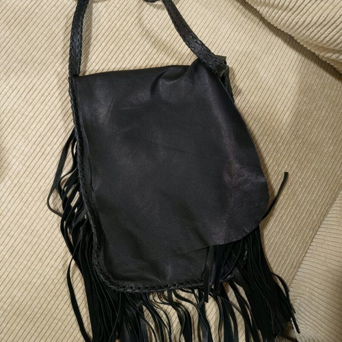 Women's leather crossbody bag with fringes nearly unused black