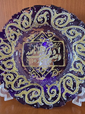 Old decorative glass plate from Jordan 2009 with Arabic calligraphy
