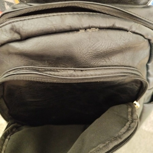 Backpack bag used, black faux leather