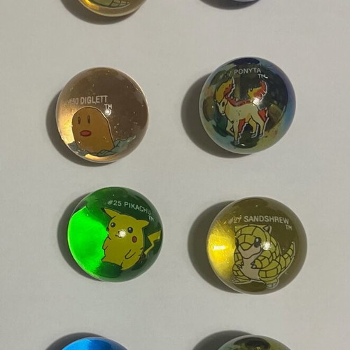 Pokemon collectible marbles used, set of 8