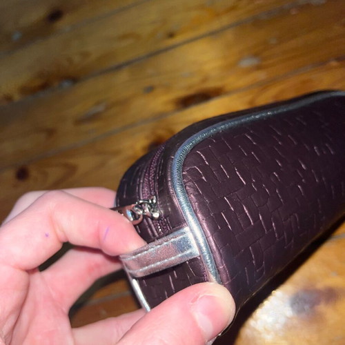 Oriflame cosmetic bag like new, brown embossed design