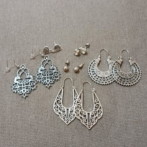 Set of six pairs of earrings new, three dangling and three small
