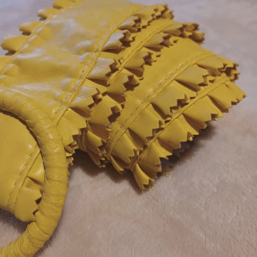 Wide belt with ring in soft yellow, like new