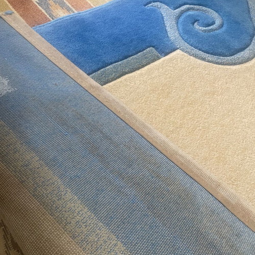 Embossed rug used, blue and beige, 1.97x1.40 m