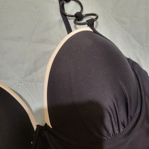 One-piece swimsuit like new, black with white details and rings, size M