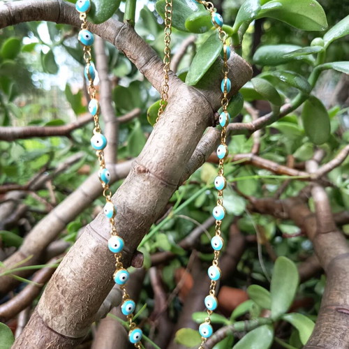 Necklace with blue evil eyes in gold color like new