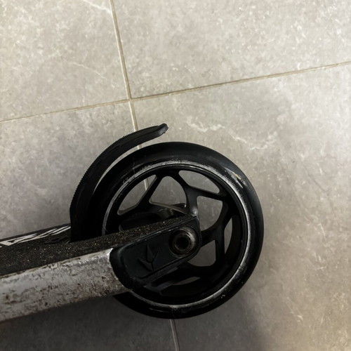 Scouter Envy scooter used with new handles, wheels, and grip tape