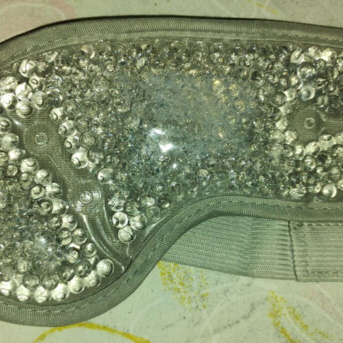 Grey gel mask with velour lining and adhesive closure, like new