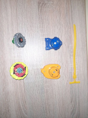 Bayblade used, 2 spinning tops with 2 launchers