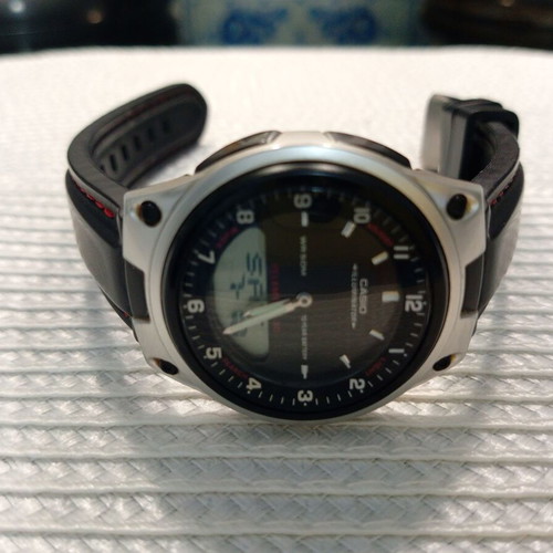 Casio Illuminator WR50M wristwatch like new with red stitched strap