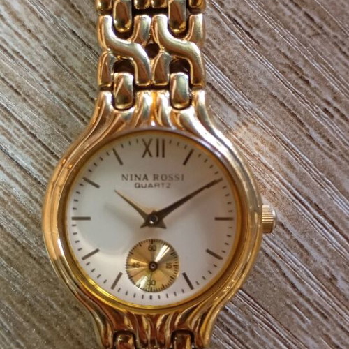 Nina Rossi wristwatch gold like new, women's