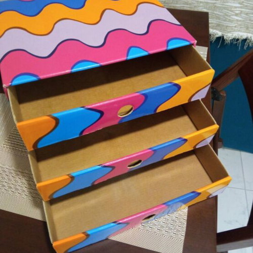 Storage box like new with three drawers, paper
