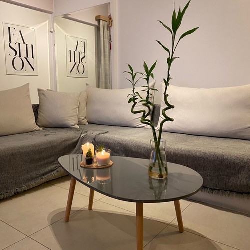 Coffee table new gray with glossy lacquer surface and solid legs
