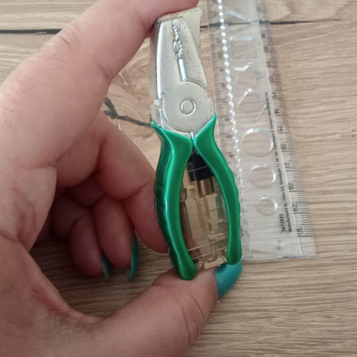Vintage collectible lighter in pliers shape, used