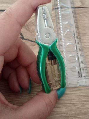 Vintage collectible lighter in pliers shape, used