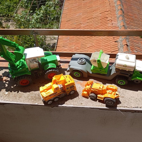 Children's construction and specialized toy trucks set of 4 used
