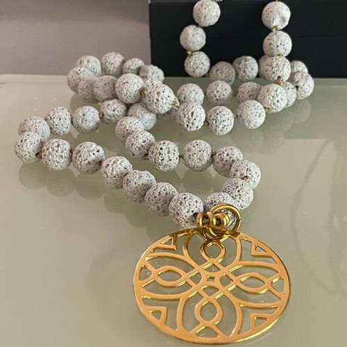 Handmade necklace with lava semi-precious stones and steel motif gray and gold