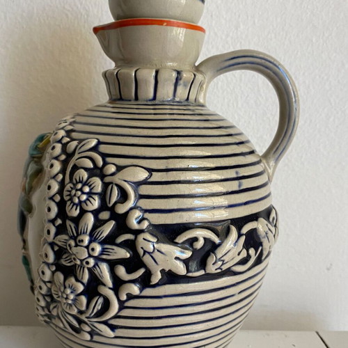 German cider earthenware jug used with relief carving