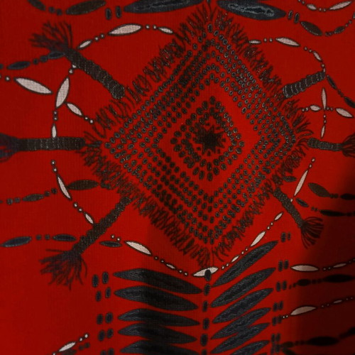 Red sleeveless top with ethnic geometric motifs, like new