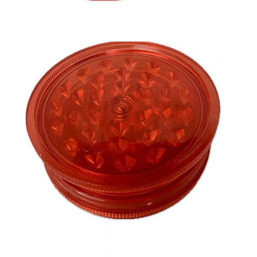 Plastic tobacco and herb grinder red, new, 60x25mm