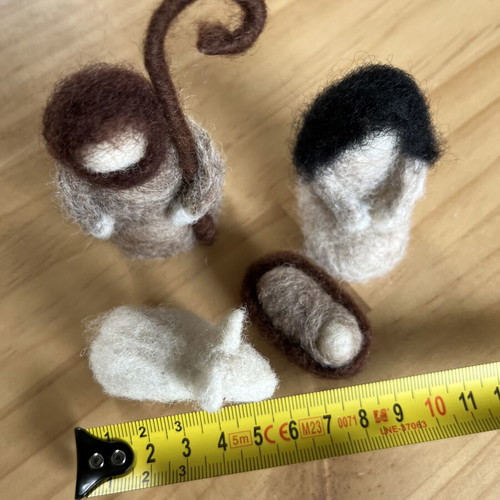 Woolen nativity scene with Mary, Joseph, baby Jesus and lamb
