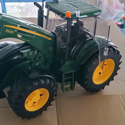 John Deere tractor like new, Bruder toy replica with opening parts