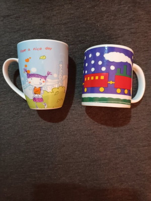 Set of 2 ceramic mugs with children’s designs like new