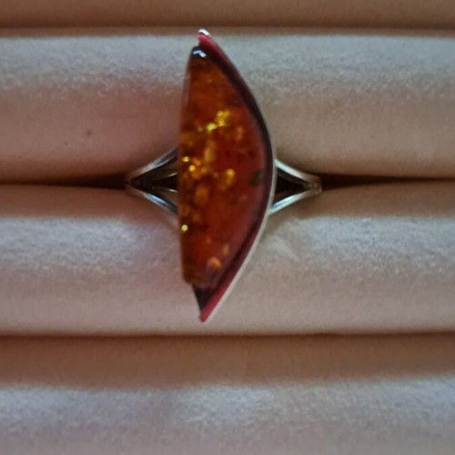 Silver ring with genuine Polish amber used, brown shade