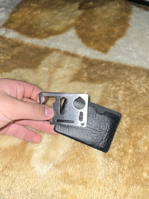 Multi-tool like new with cutter and wallet card slot