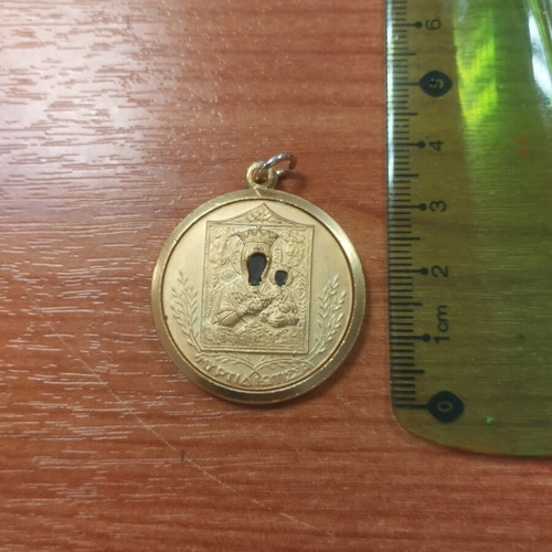 Metal religious amulet from Italy