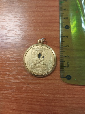 Metal religious amulet from Italy